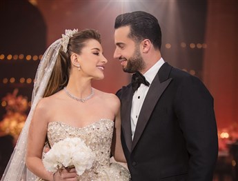 A Fairytale Cake Cutting Moment in a Georges Hobeika Couture Gown!